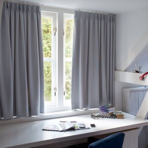 Commercial Pinkc Pleat Curtains In Office