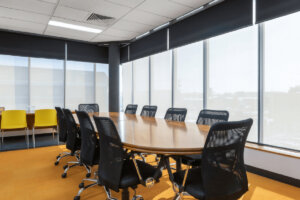 Commercial Double Roller Blinds In Boardroom